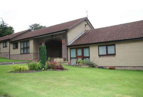 Exterior view of a senior living facility entrance