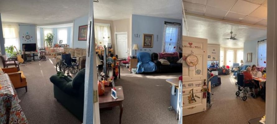 Common area with residents interacting in a cozy living space.