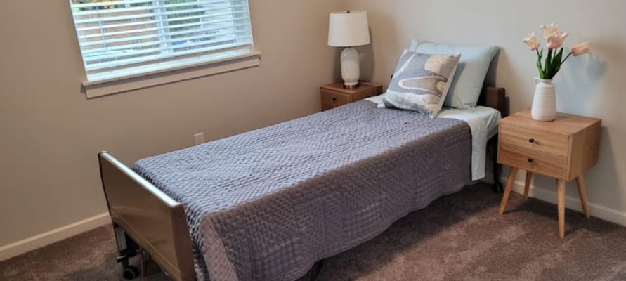 Cozy private resident room with a bed and decor