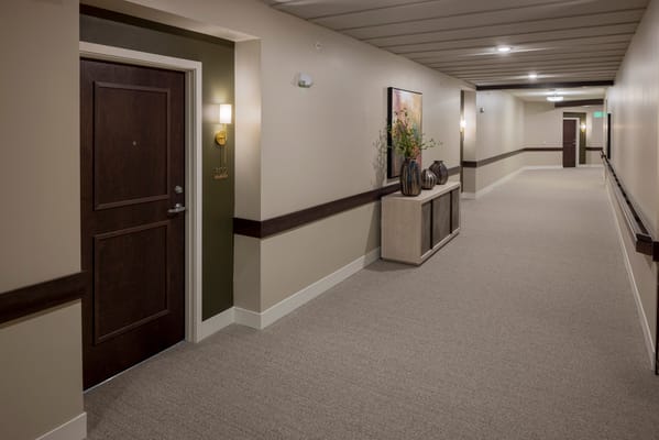 Bright and welcoming hallway with room doors