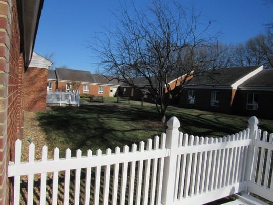 View of the outdoor space with buildings in the background