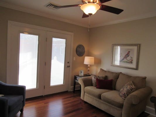 Cozy living area with a sofa and lamp