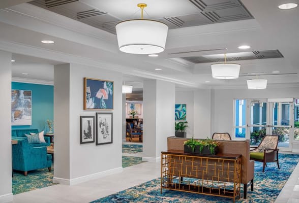 Bright and spacious lobby with seating and artwork