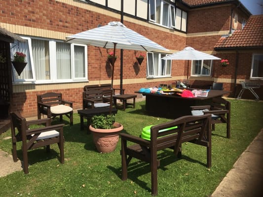 Outdoor seating area with umbrellas and tables