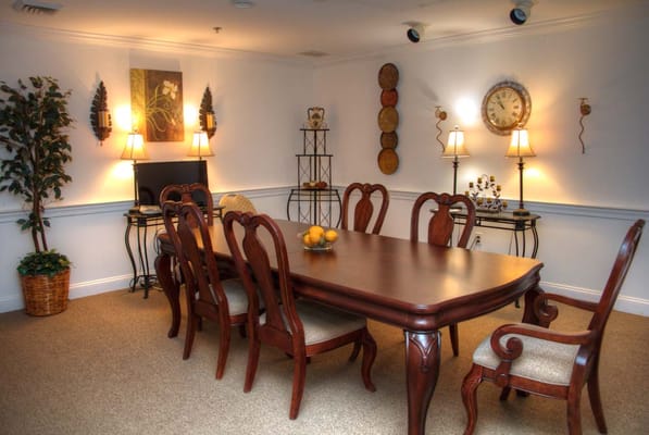 Dining room with a large wooden table and seating