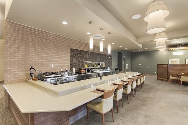 Modern dining area with seating and serving station