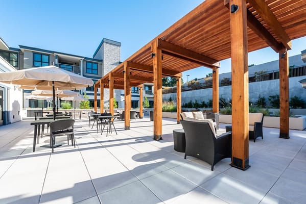 Outdoor seating area with shaded pergola