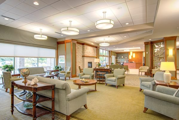 Bright and open common area with seating and ambiance