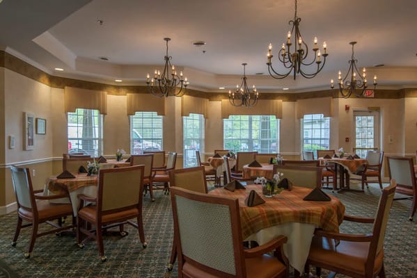 Interior dining room with tables and chandeliers