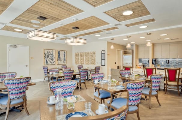Dining area with colorful chairs and tables