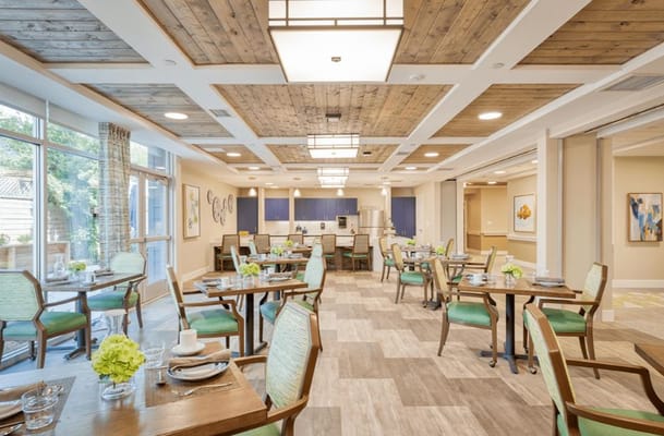 Bright dining area with tables and chairs