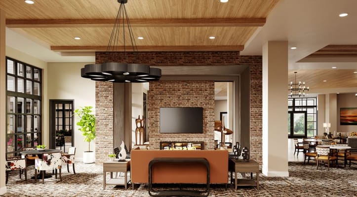 Bright and welcoming interior common area with seating