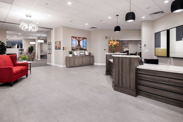 Interior lobby of an assisted living facility with seating