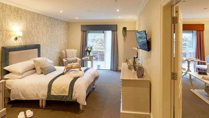 Well-furnished private bedroom in a care home