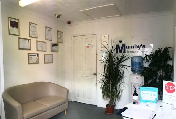 Interior of Mumby's Homecare Support office with awards and decor