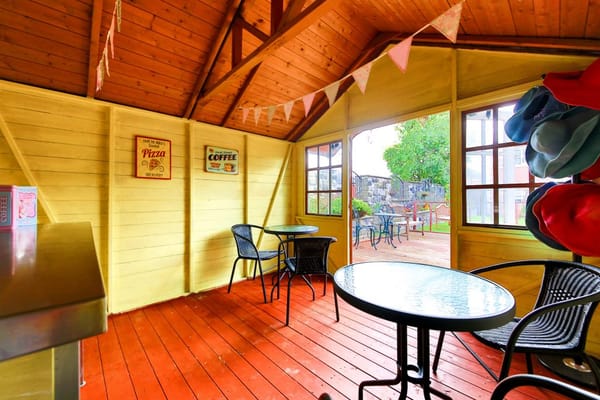A common outdoor area with tables and chairs