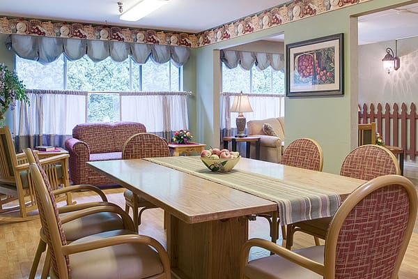 Common area with dining table and seating