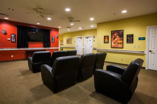 Interior common area with seating and TV