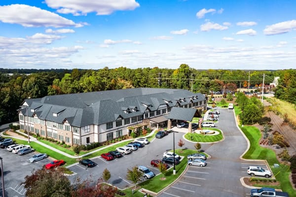 Aerial view of the Oaks at Douglasville facility with parking and gardens