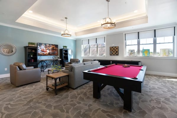 Interior common area with pool table and seating
