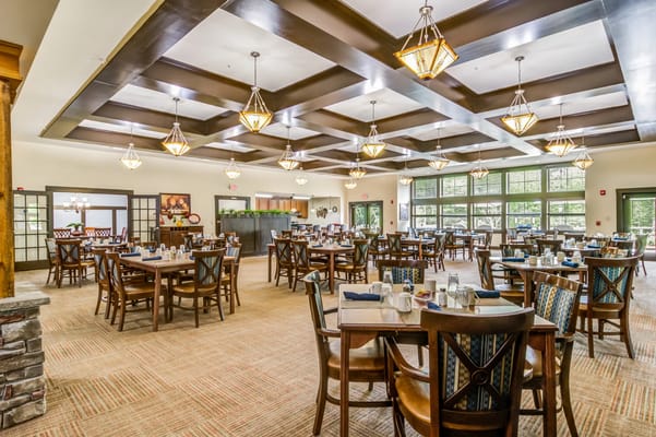 Dining room with tables and seating for residents