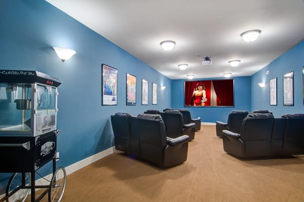 Interior view of a movie theater room with seating