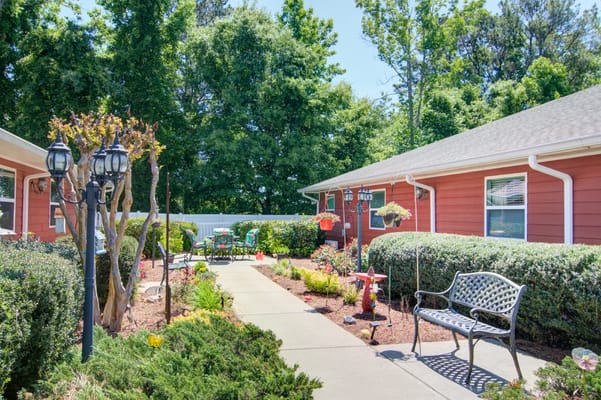Beautifully landscaped outdoor space with pathways and seating