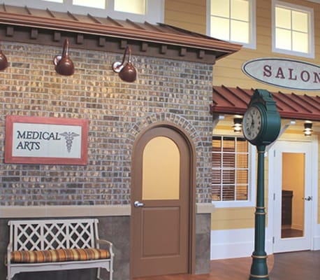 Medical Arts entrance with a vintage clock and signage