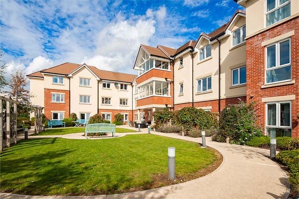 Exterior view of Ridgeway Rise Care Home with outdoor space