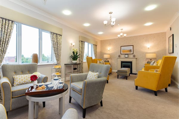 Bright common area with seating and decor