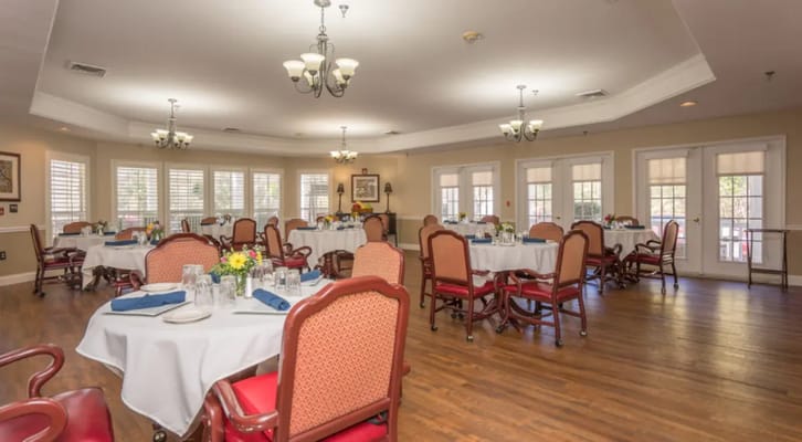 Dining room with tables set for a meal
