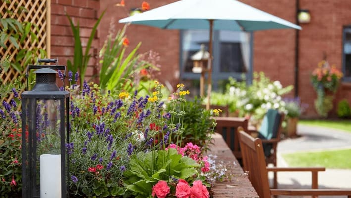 Vibrant garden with flowers and seating area
