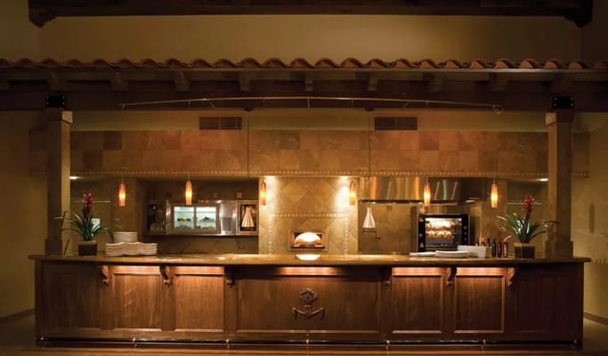 Elegant kitchen bar with modern lighting and decor