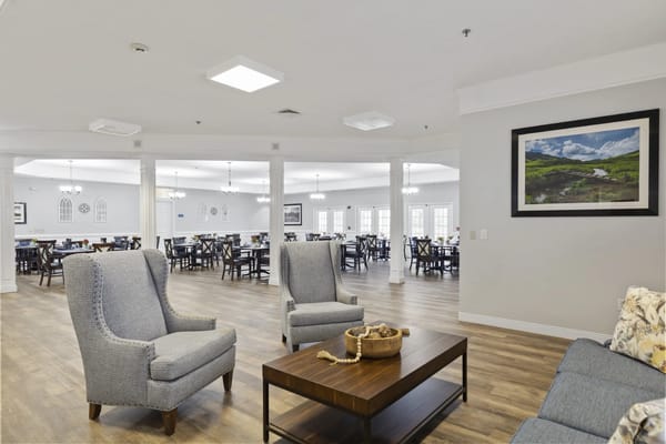Bright and spacious dining area with tables and chairs