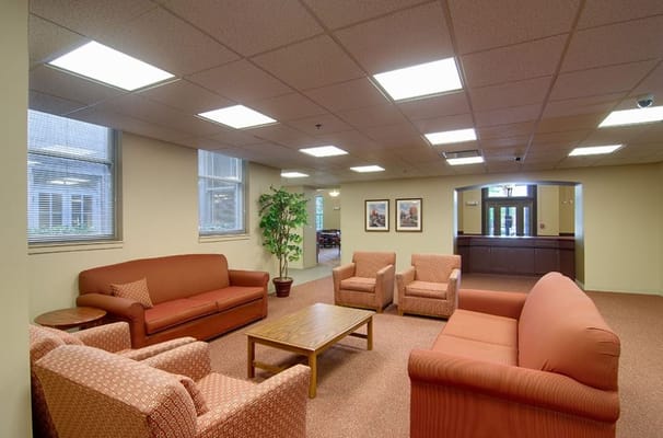 Cozy living room with seating and natural light