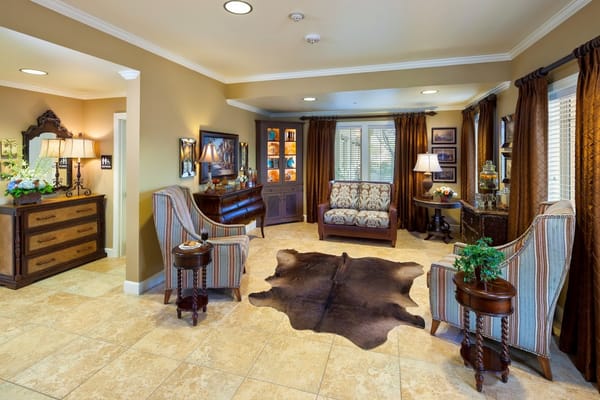 Cozy living room with comfortable seating and decorative accents.