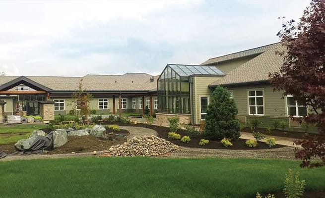 Exterior view of Silverado Bellingham with gardens