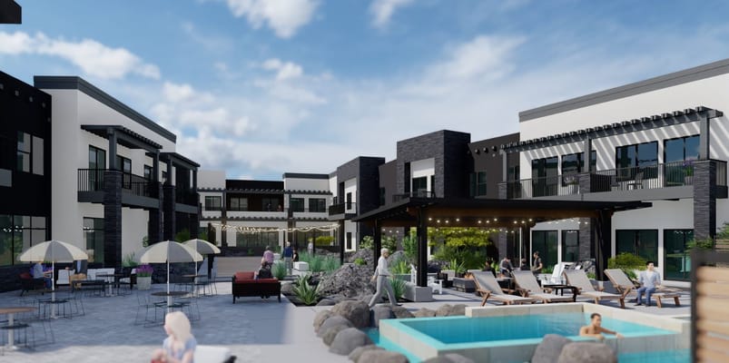 View of the outdoor pool area with seating and residents interacting