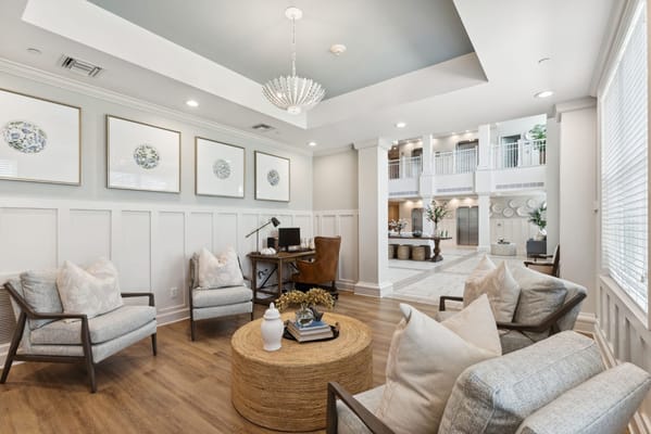 Bright common area with comfortable seating and decor