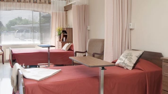 A shared bedroom in a senior living facility