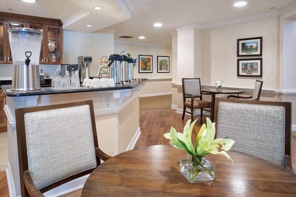 Bright common area with seating and decor