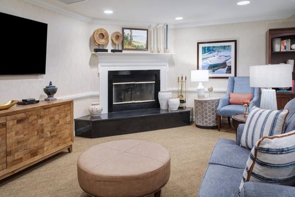 Cozy common area with seating and fireplace