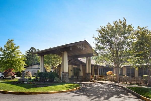 Main entrance of Sunrise at Bon Air with landscaped surroundings