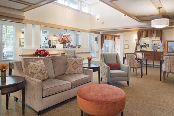 Comfortable living room with seating and floral decor