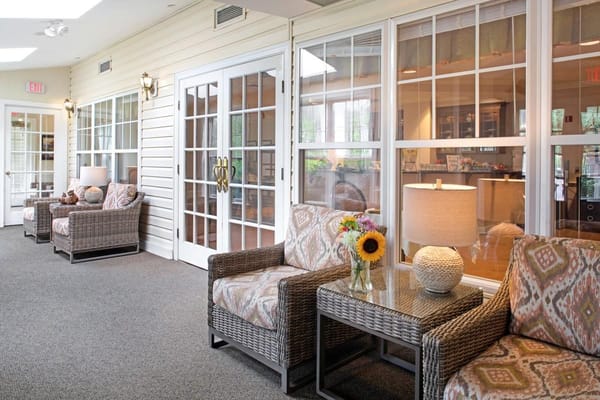 Comfortable seating area in the living room with floral decor