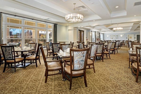 Interior view of the dining room with tables and chairs