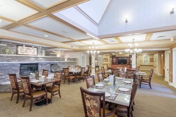 Interior view of a dining room with tables and chairs