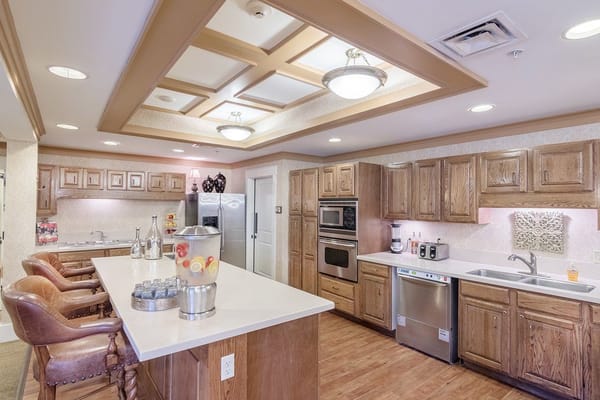 Bright, modern kitchen area in a senior living facility