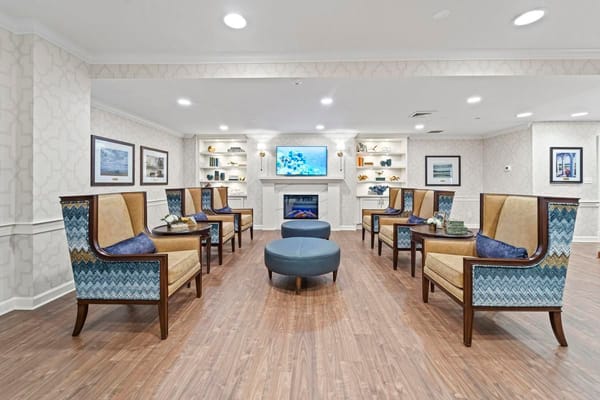 Bright common area with comfortable seating and decor