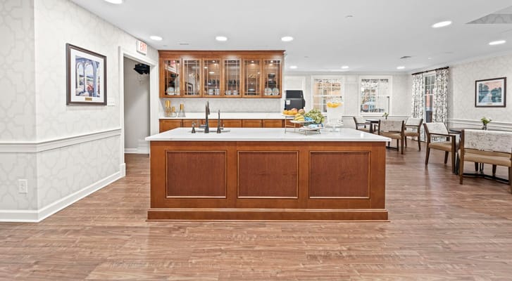 Bright common area with wooden furniture and decor